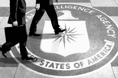 Figures of people walking on the CIA logo at CIA headquarters in Langley, VA.