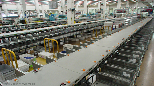 Sorting at a mailroom. Photo source: Jason V. via Wikimedia