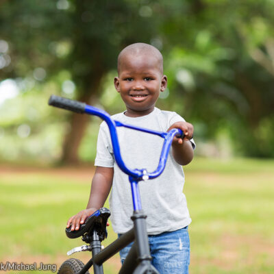Boy with Bicycle