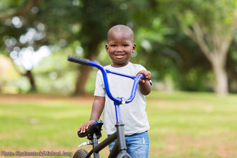 Boy with Bicycle