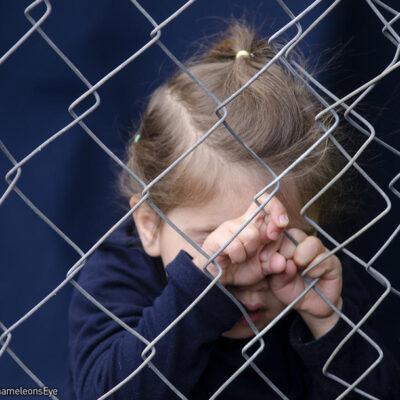 Child on fence