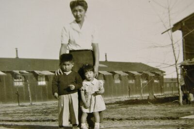 Satsuki Ina as a toddler with her mother and brother.