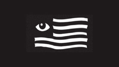a black flag with white stripes and a white eye