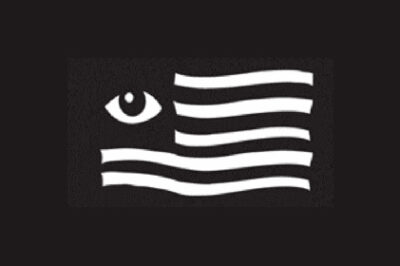 a black flag with white stripes and a white eye