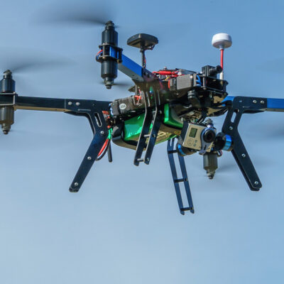 Drone hovering in sky