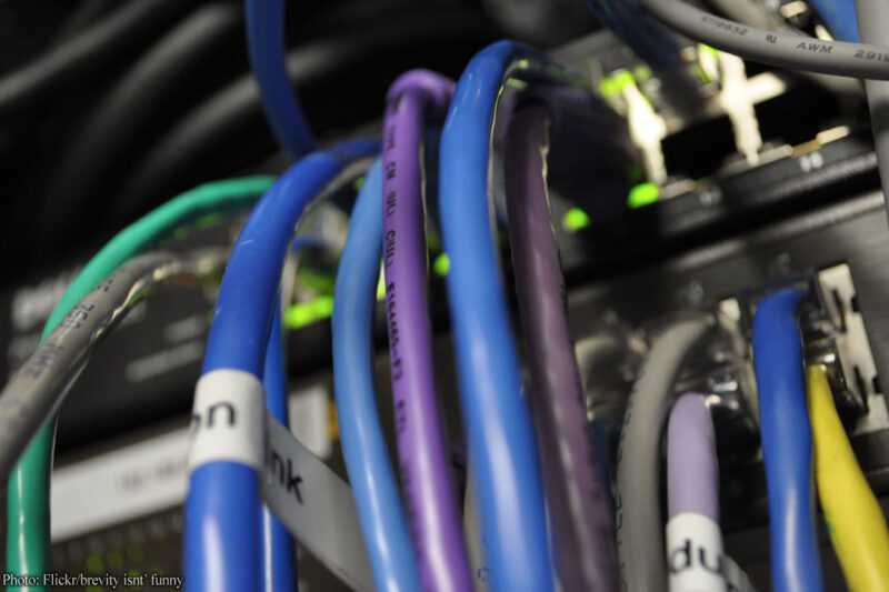 Ethernet cables going into router