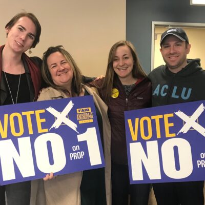 From left: Lillian Lennon (Transgender Community Organizer, ACLU of Alaska); Liz Welch (ACLU); Kati Ward (Fair Anchorage Campaign Manager); Joshua Decker (Executive Director, ACLU of Alaska). All holding "Vote no on prop 1 signs."