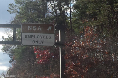 Sign at entrance to NSA building: "Employees Only"