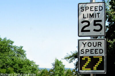 photo of radar speed sign: "Speed limit: 25 / Your speed: 27"