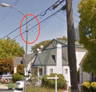 Photo of microphone on street pole next to house