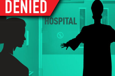 Bishop blocking hospital doors