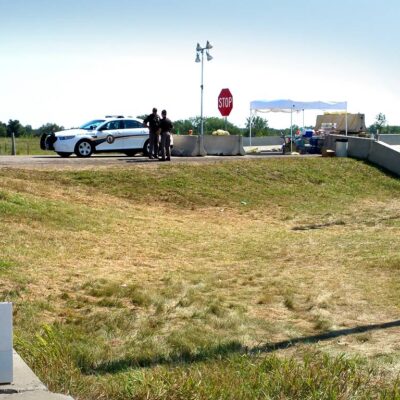 Police enforce a road barricade on a public highway that leads to the protest area and the Standing Rock Sioux Tribe’s reservation.