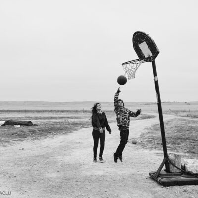 Native Kids playing basketball