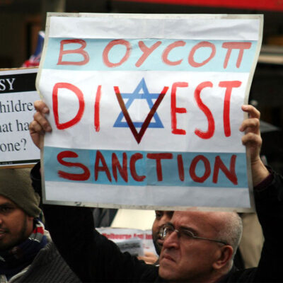 Boycott Divest Sanction Sign at Protest