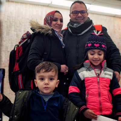 Iraqi refugee family arriving at John F. Kennedy International Airport