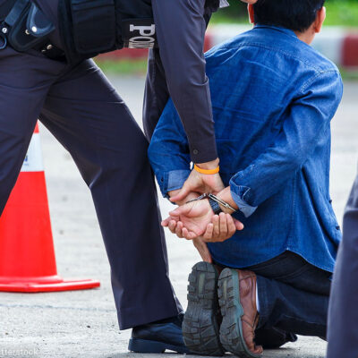 Police Arrest Man With Blue Shirt