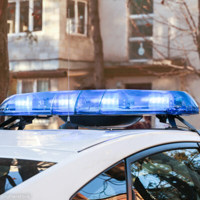 Police Car in Neighborhood