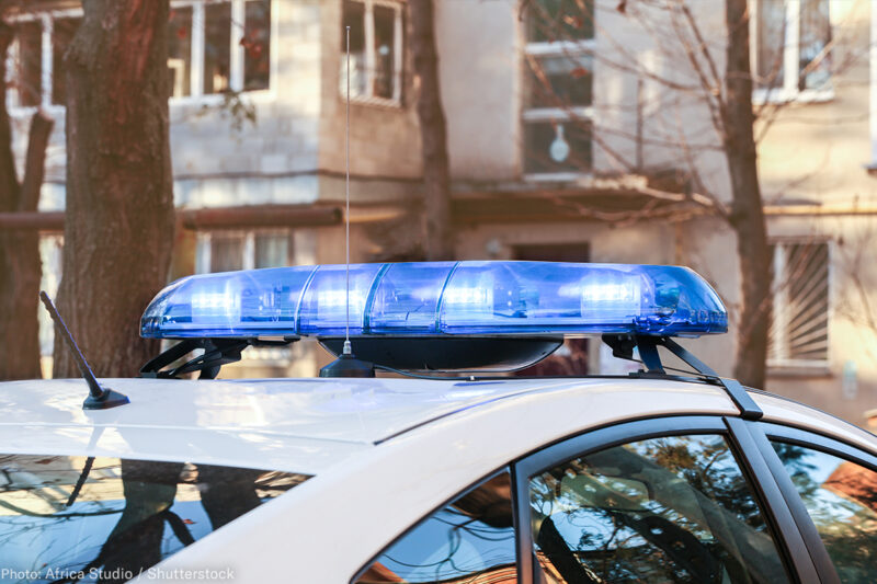 Police Car in Neighborhood