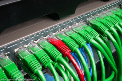 Server rack with green and red wires