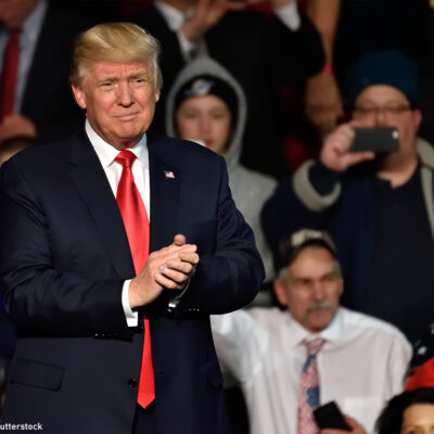 Trump with his hands together