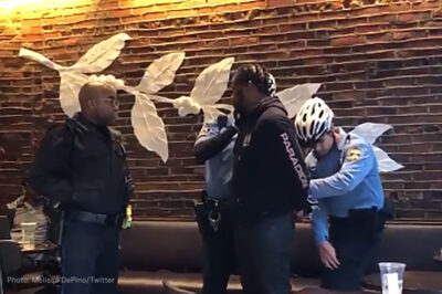 Police arrest a Black man waiting in a Starbucks
