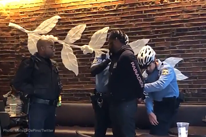 Police arrest a Black man waiting in a Starbucks