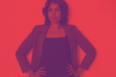 Woman with hands on hips