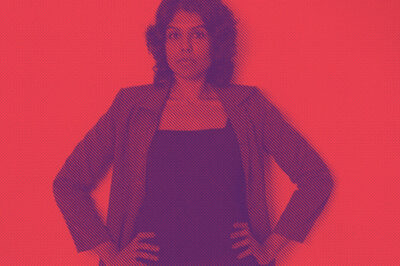 Woman with hands on hips