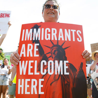 Demonstrators marching in favor of immigrant's rights