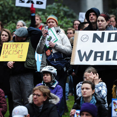 Protesters demonstrating against immigrant ban
