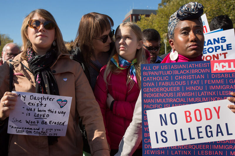 Protesters marching in favor of the rights of trans people