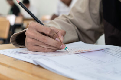 A student erasing answers from a test