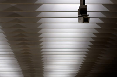 Surveillance camera mounted on a ceiling