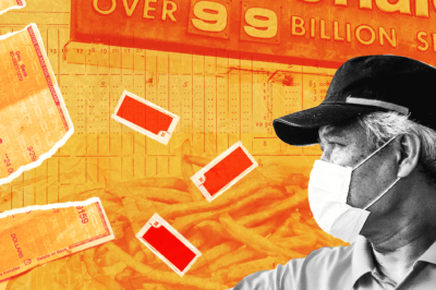 McDonalds worker wearing face mask on orange background.