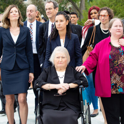 Aimee Stephens with her wife and legal team outside the Supreme Court.