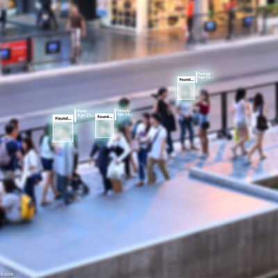 Facial recognition software scanning a crowd.