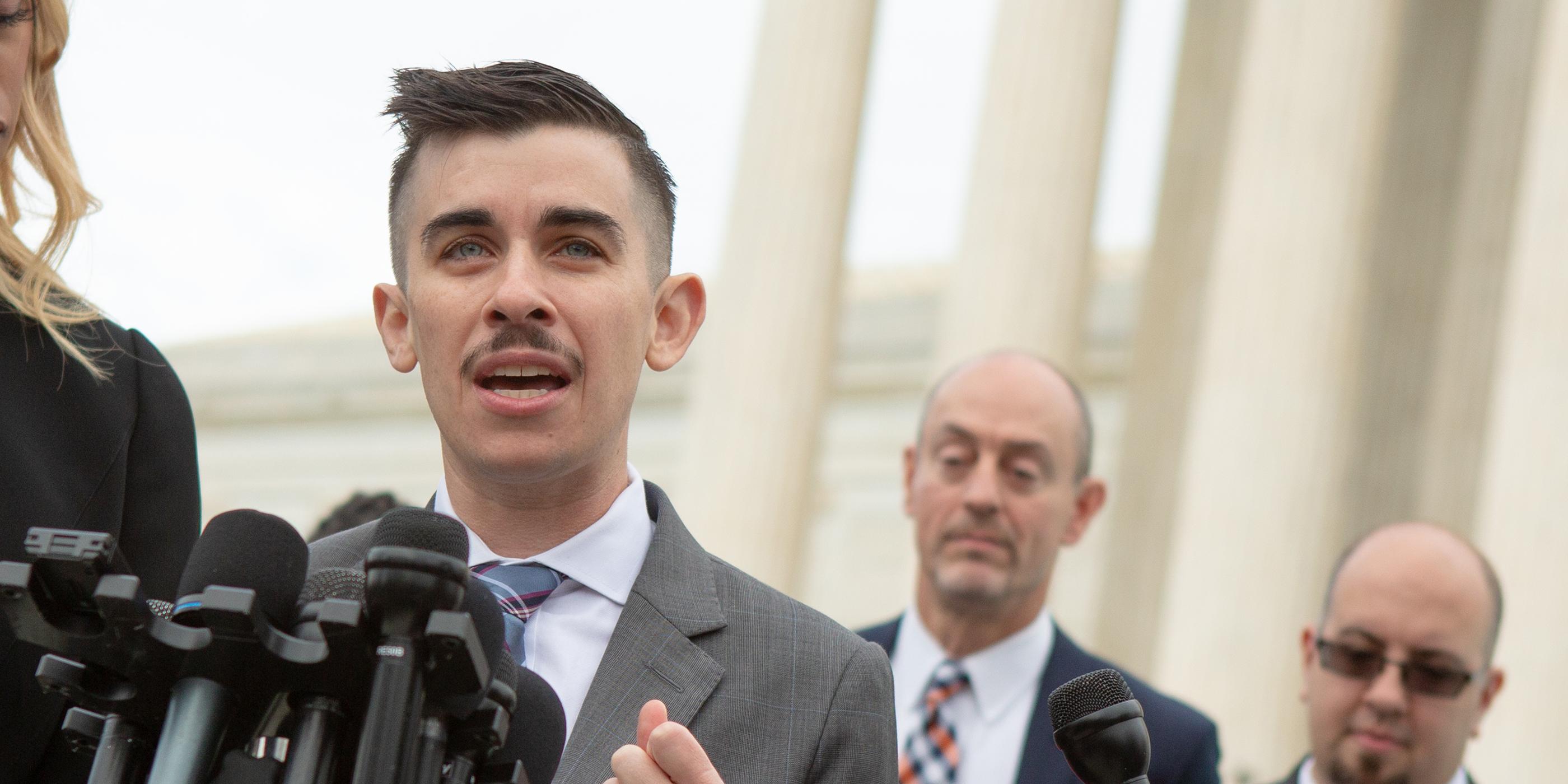 ACLU lawyer Chase Strangio speaking outside the Supreme Court.