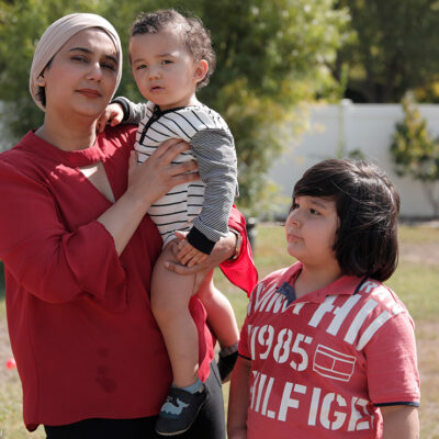 Urooj Alavi with her two children.