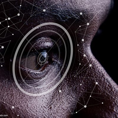 Facial recognition software scanning a face.