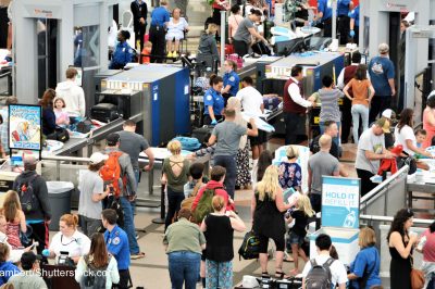Travelers waiting in long lines to pass through the Transportation Security Administrations (TSA) security screening areas to get to their flights.