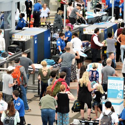 Travelers waiting in long lines to pass through the Transportation Security Administrations (TSA) security screening areas to get to their flights.