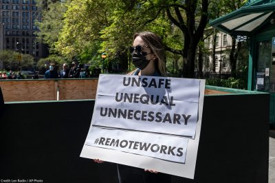 Municipal workers union gather on City Hall in New York for May Day protest against returning to offices.
