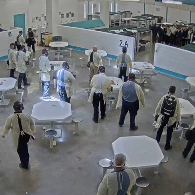 A screenshot of surveillance video taken shortly before men detained at the Torrance County were pepper-sprayed for engaging in a peaceful hunger strike