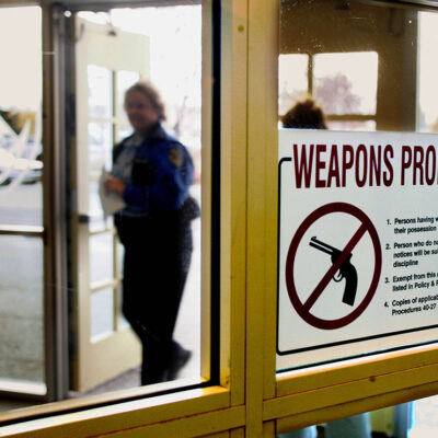 A sign at the entrance of the city hall in Anchorage, Alaska, that warns handgun owners that guns are prohibited in the building.