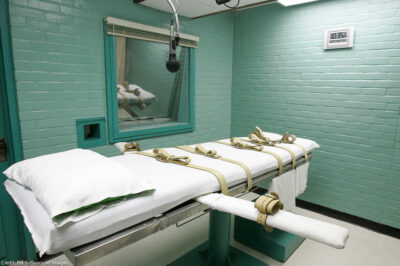 A gurney with straps.