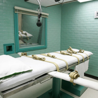 A gurney with straps.