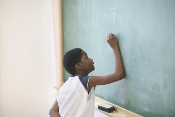 Student at chalkboard
