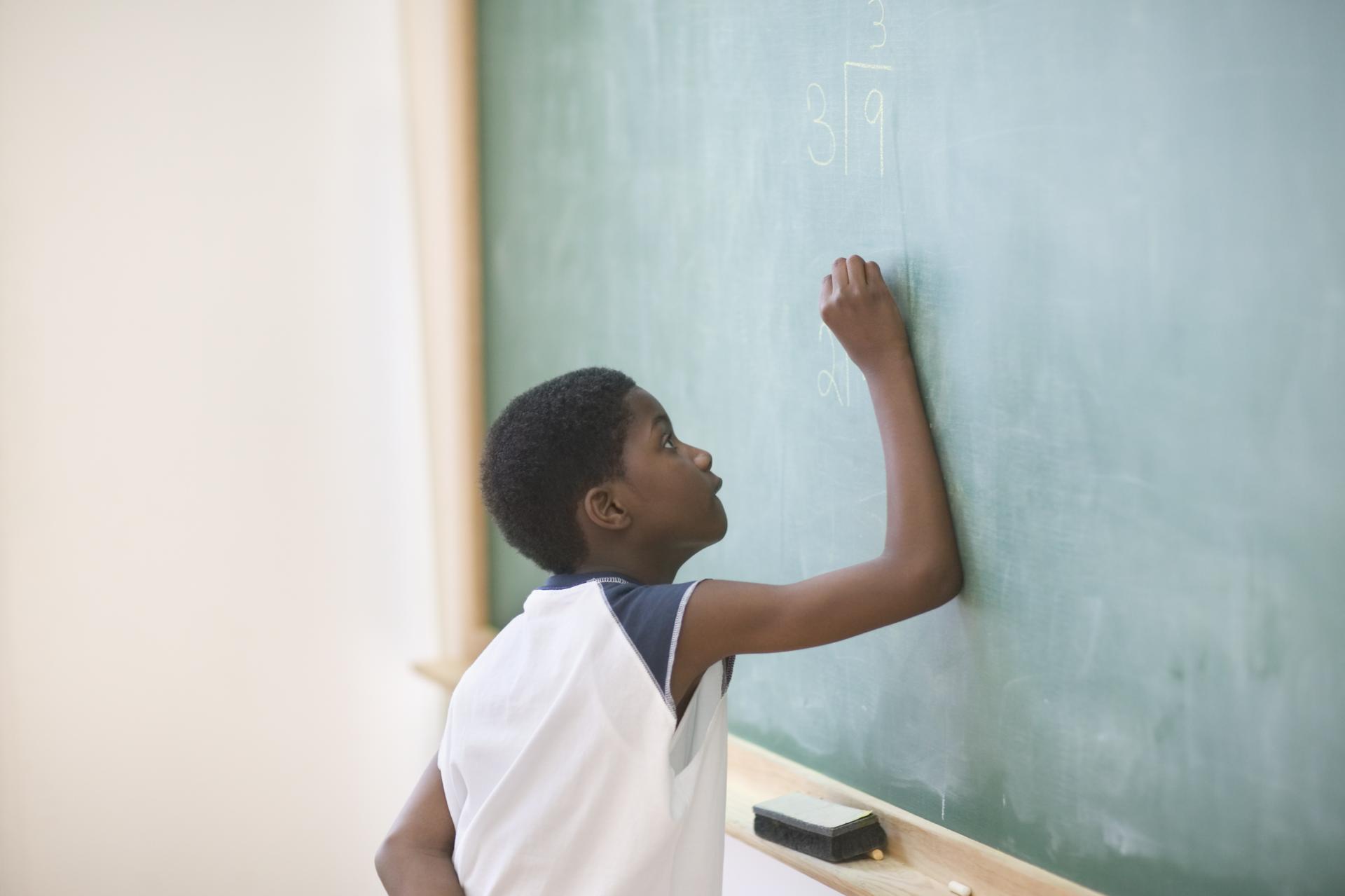 Student at chalkboard