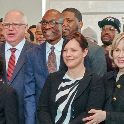 Watching Gov. Tim Walz sign House File 28 into law at the Minnesota Department of Revenue in March 2023.