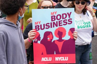 ACLU supporters marching at a reproductive rights rally.